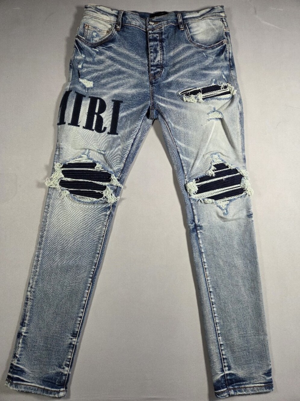 AMIRI Distressed Light Blue Denim Jeans with Navy Patch Details NWOT 36x30